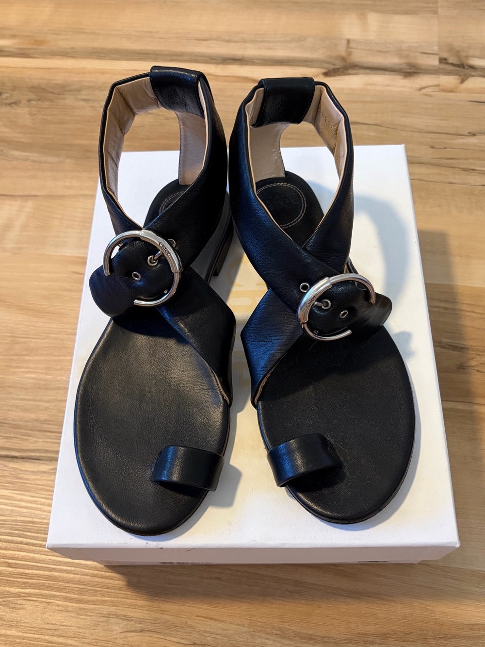 Chloe Women's Black Leather Ankle-Strap Sandals with Silver Buckle